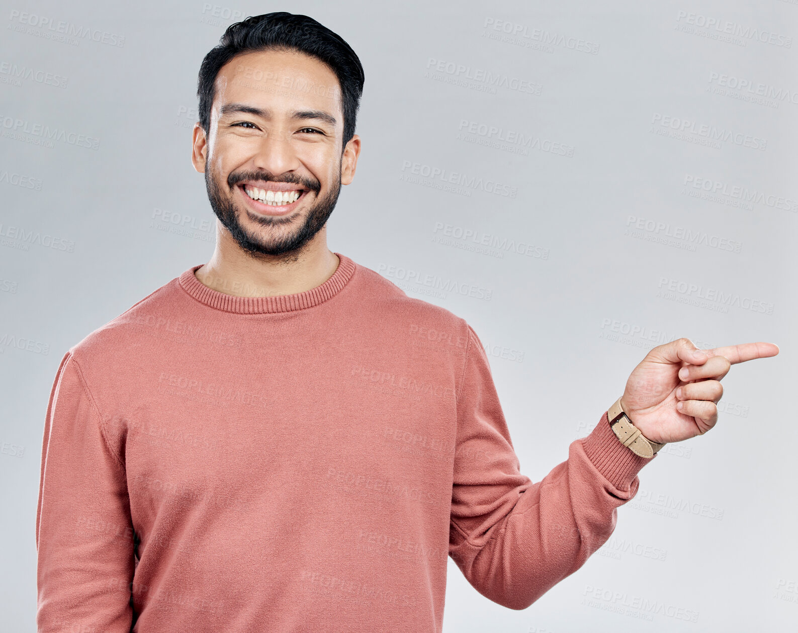 Buy stock photo Smile, space and portrait of Indian man pointing with mockup and product placement isolated on white background. Promotion, information and person showing deal announcement in studio with launch idea