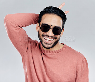 Buy stock photo Cool, funny and funky Asian man with sunglasses isolated on a white background in a studio. Portrait, comic and a laughing stylish Chinese guy with fashionable eyewear and crazy gesture on a backdrop