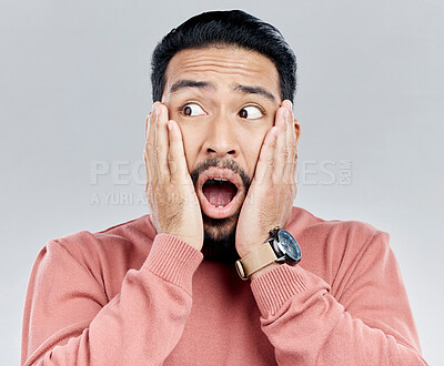 Buy stock photo Wow, surprise and Indian man with hands on face in shock, omg and deal announcement in studio. Emoji, meme and excited person with info for shocking gossip, news or information on white background.