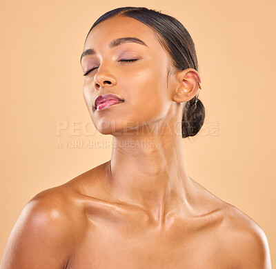 Buy stock photo Beauty, face and skin of woman in studio for skincare, cosmetics, dermatology or makeup. Aesthetic female 
eyes closed for self care, natural shine and spa facial results on a brown background