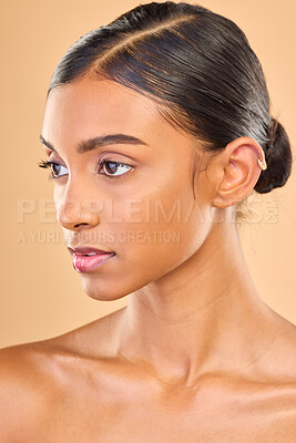 Buy stock photo Skincare, face and beauty of woman in studio for glow, cosmetics, dermatology or makeup. Aesthetic female 
profile for self care, natural skin and spa facial shine results on a brown background