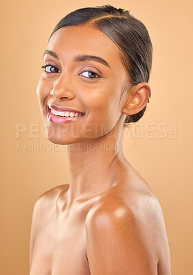 Buy stock photo Smile, beauty and portrait skincare of a woman isolated on a studio background. Happy, beautiful and an Indian model with a glow from cosmetics, healthy skin and smooth complexion on a backdrop