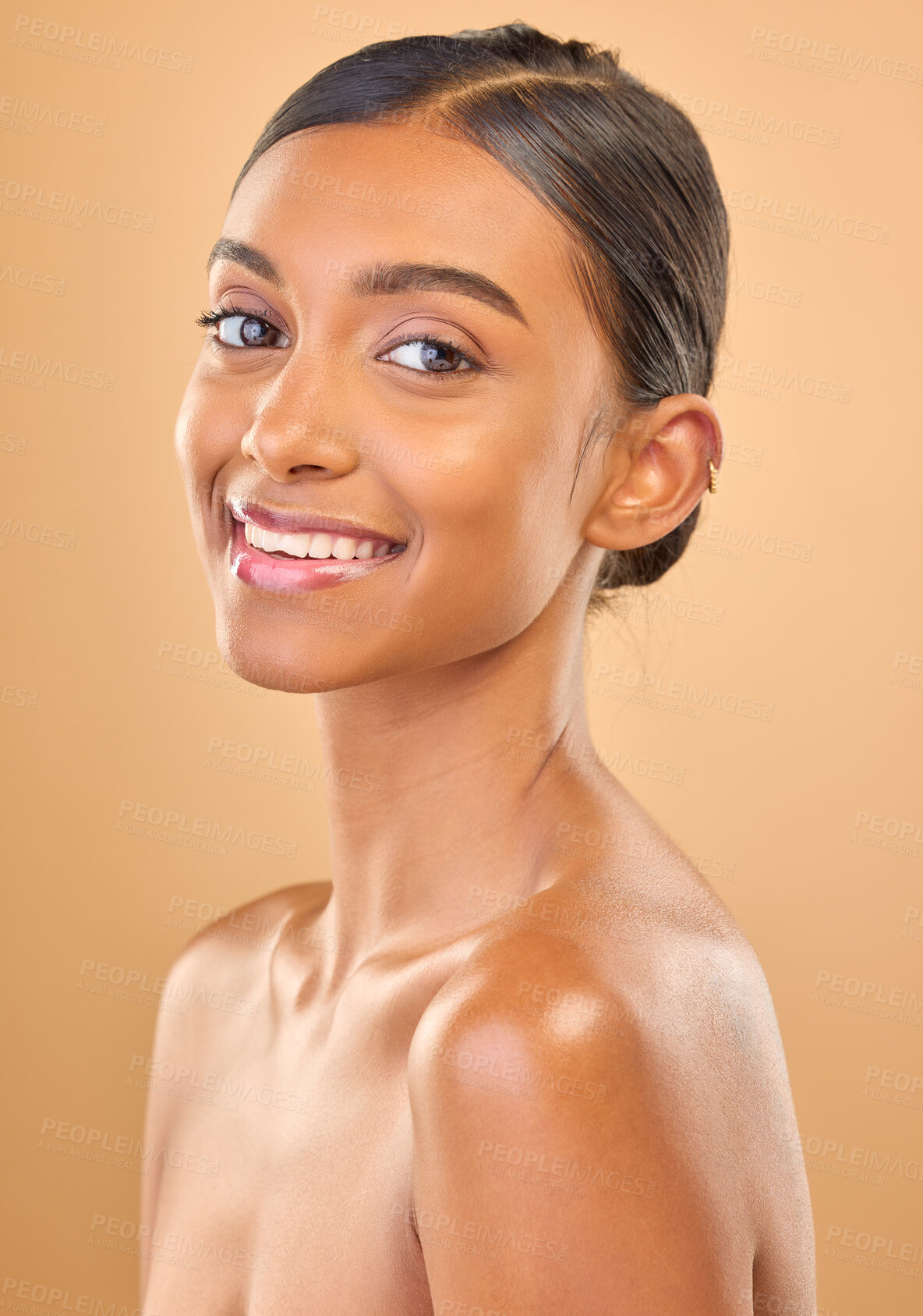 Buy stock photo Smile, beauty and portrait skincare of a woman isolated on a studio background. Happy, beautiful and an Indian model with a glow from cosmetics, healthy skin and smooth complexion on a backdrop