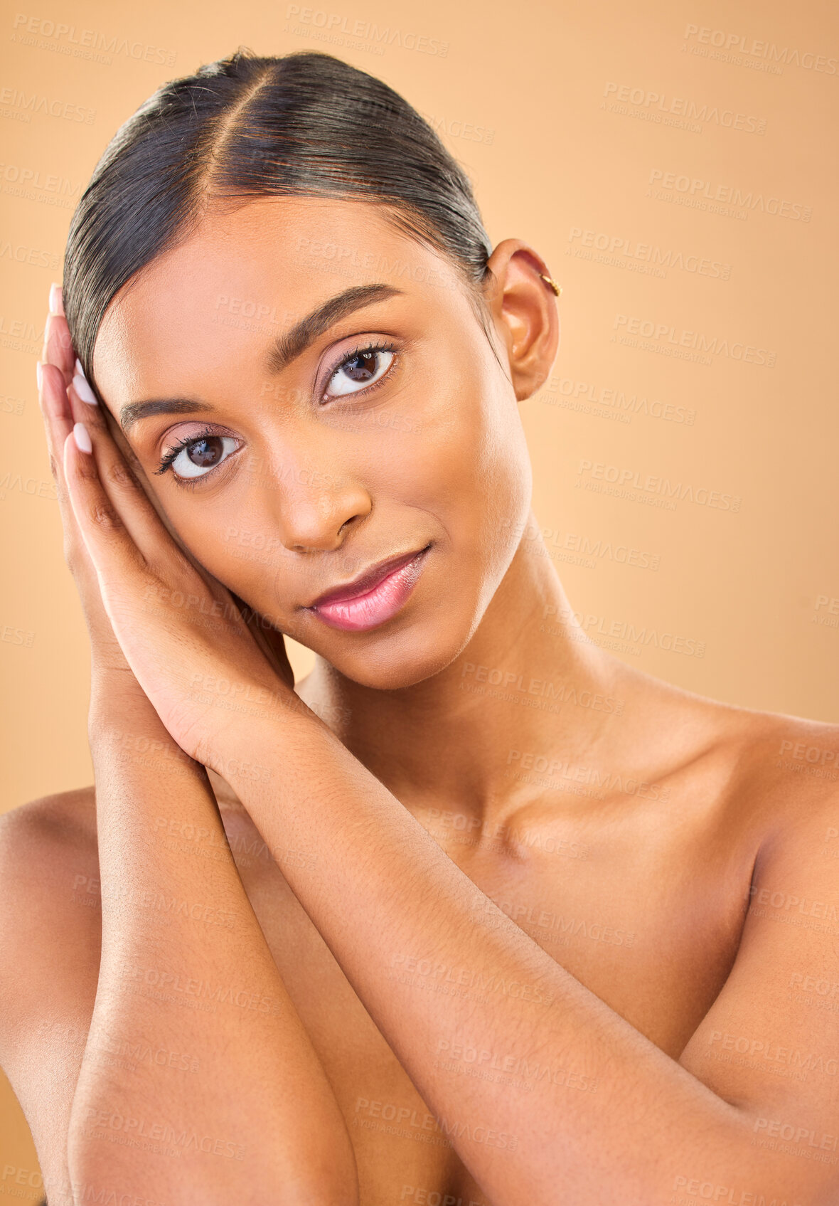 Buy stock photo Face portrait, skincare and beauty of woman in studio isolated on a brown background. Makeup, natural cosmetics and serious Indian female model with spa facial treatment for healthy or flawless skin.