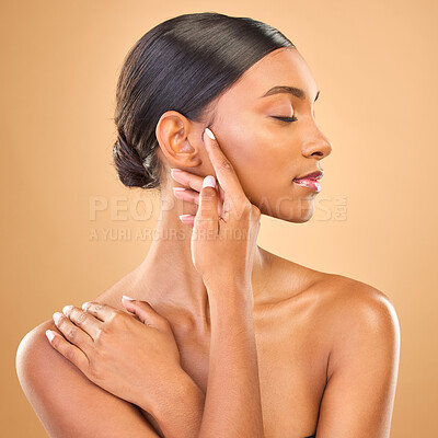 Buy stock photo Beauty, face profile and skin of woman in studio for skincare, cosmetics, dermatology or makeup. Aesthetic female model 
hands for natural self care and spa facial shine results on a brown background