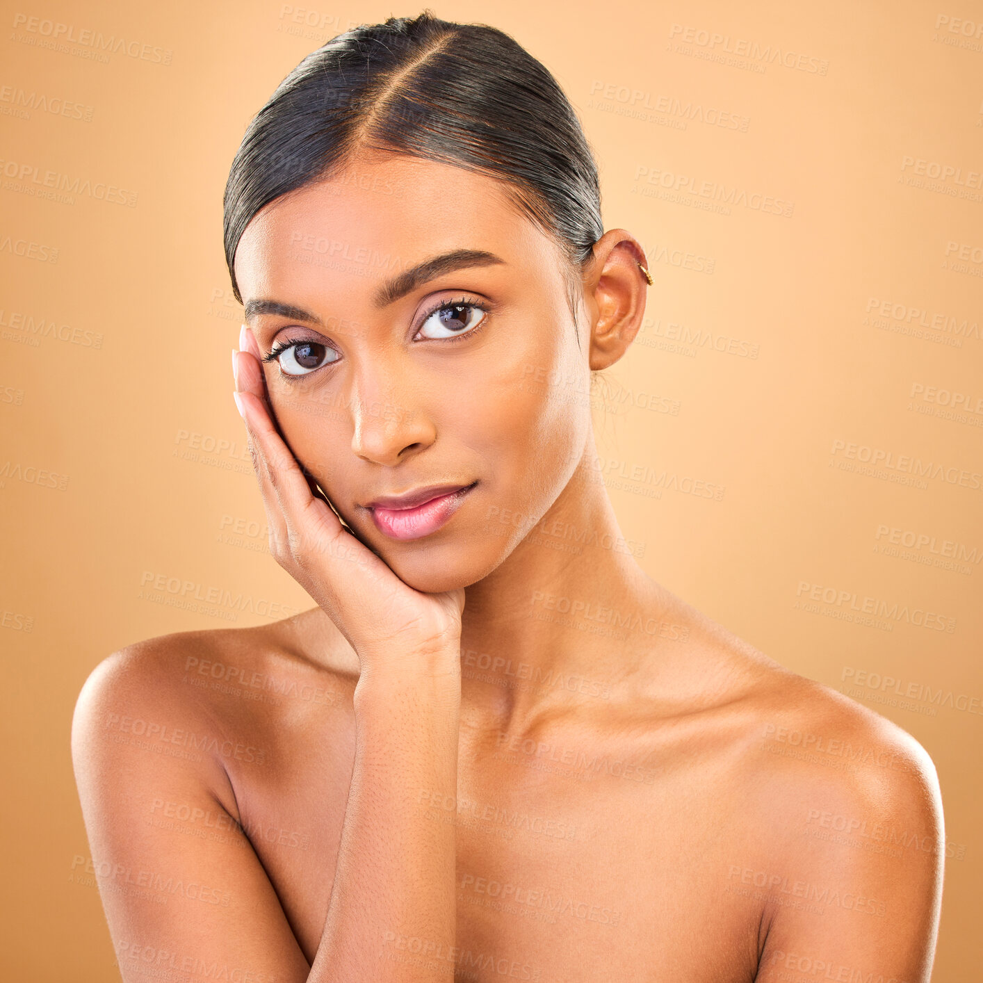 Buy stock photo Skincare, face portrait and beauty of woman in studio isolated on brown background. Makeup, cosmetics and confident Indian female model with spa facial treatment for healthy, glowing or flawless skin