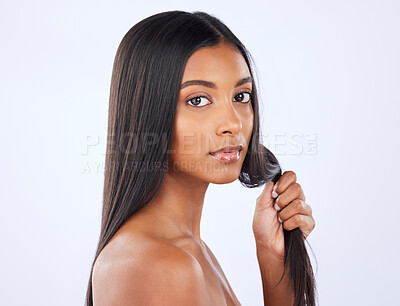 Buy stock photo Woman, strong hair and beauty and haircare in portrait with cosmetic care and keratin treatment on studio background. Serious, Indian female with hairstyle and skin glow, Brazilian and cosmetics