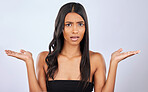 Indian woman, hair care or confused in studio portrait for healthy natural shine options or beauty choices. Face of young girl model, doubt or self care cosmetics in grooming on white background