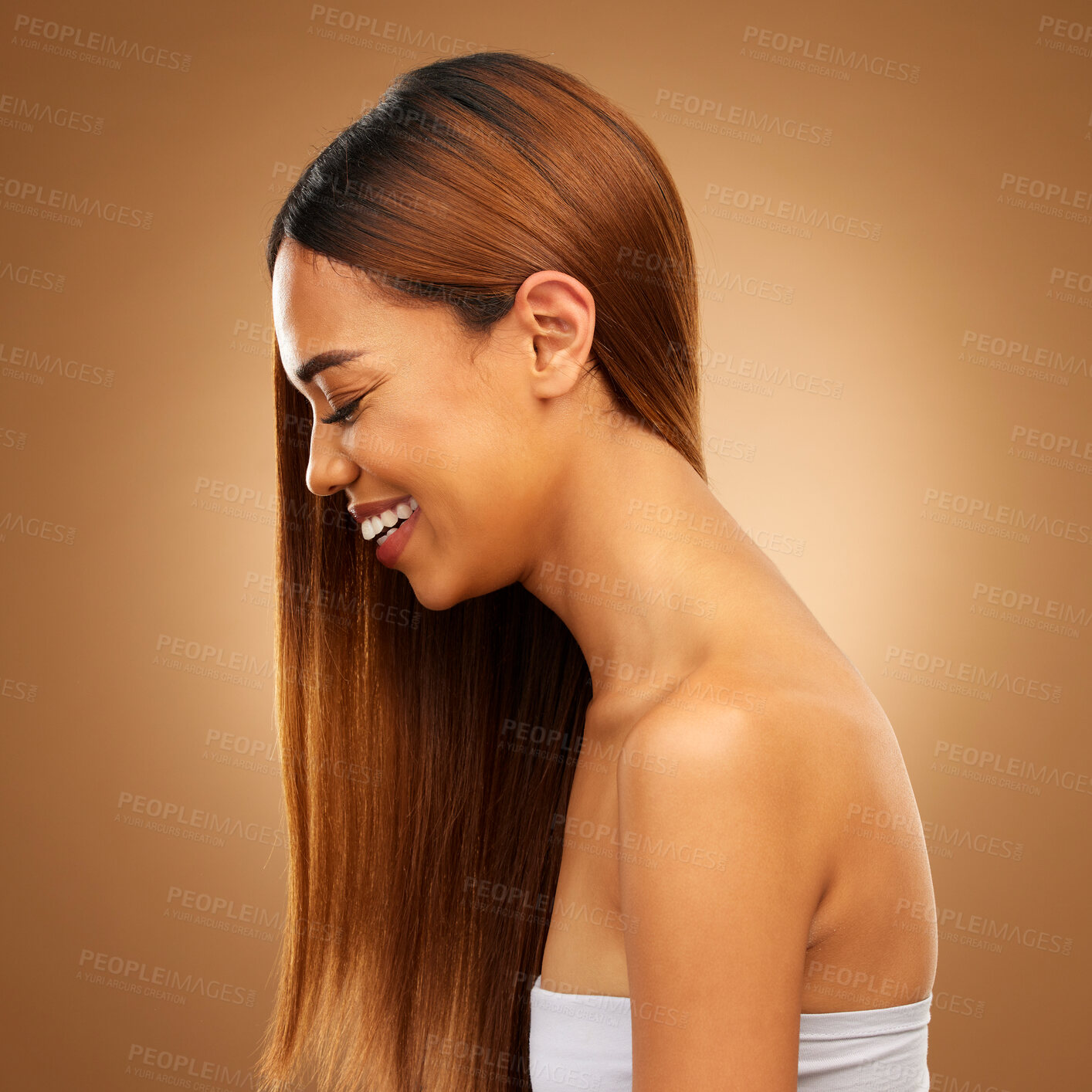 Buy stock photo Haircare, beauty and woman of laughing in studio for growth and color shine or healthy texture. Aesthetic female happy face for hair, natural skincare and hairdresser or salon on brown background
