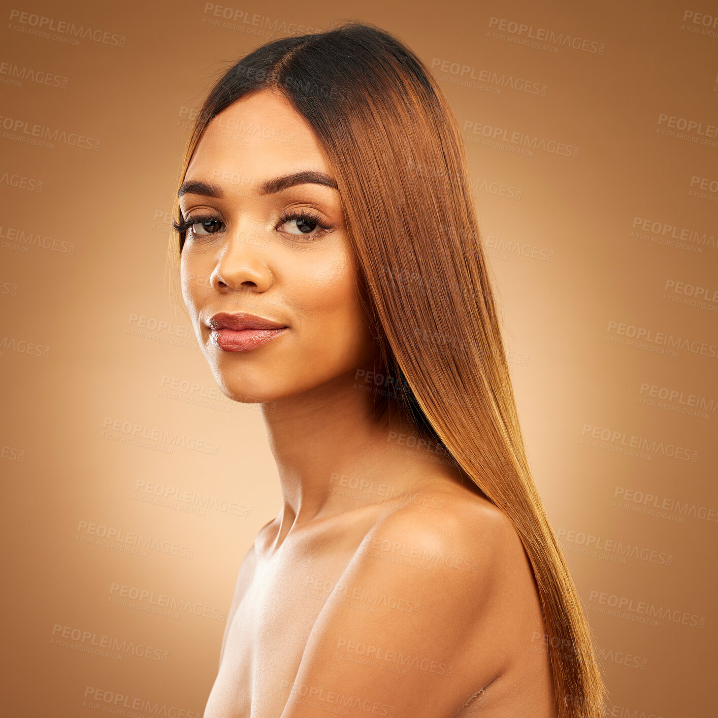 Buy stock photo Beauty, hair care and portrait of serious woman in studio for growth, color shine or healthy texture. Aesthetic female model for haircare, natural makeup and hairdresser or salon on brown background
