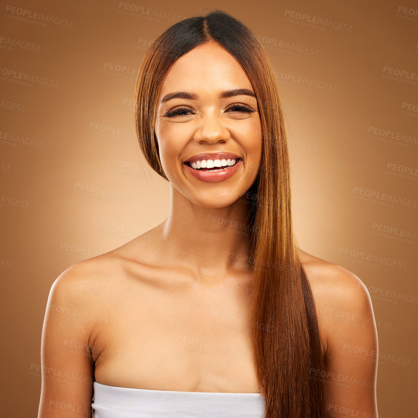 Buy stock photo Smile, beauty and hair care portrait of woman in studio for growth, color shine or healthy texture. Happy female face for haircare, natural makeup and hairdresser or salon on brown background
