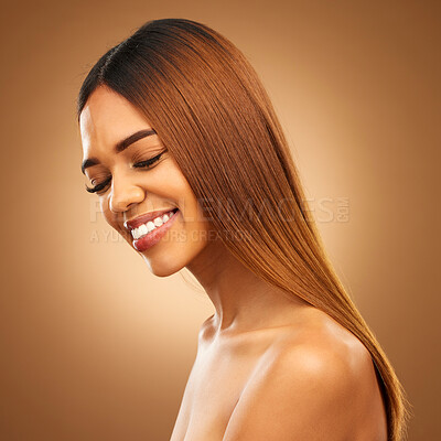 Buy stock photo Smile, beauty and hair care of woman in studio for growth, color shine or healthy texture. Aesthetic female happy for haircare, natural skincare and hairdresser or salon mockup on brown background
