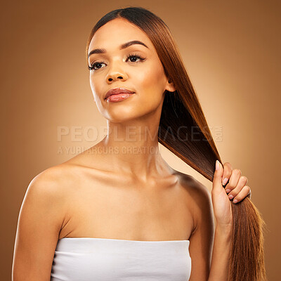 Buy stock photo Haircare, woman with strong straight hair in hand and studio space with texture and salon shine. Beauty model, healthy hairstyle and wellness, natural keratin product promotion on brown background.