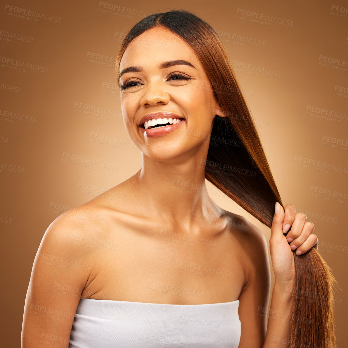 Buy stock photo Haircare, smile and woman with strong straight hair in hand and studio space with texture and salon shine. Beauty model, healthy hairstyle and natural keratin product promotion on brown background.