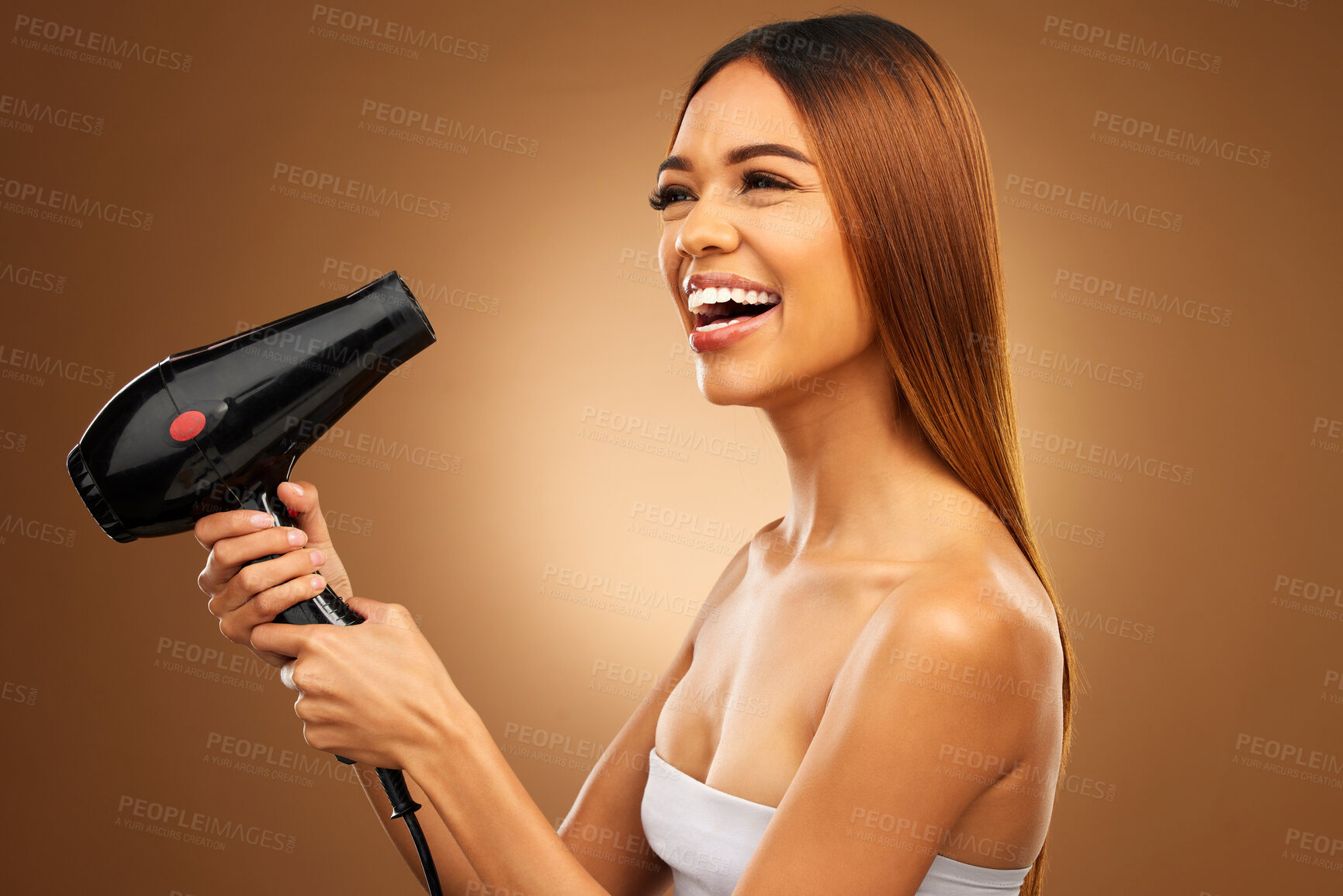 Buy stock photo Hairdryer, beauty tools and happy woman with hair care, face and blow drying on brown background. Cosmetics, equipment and keratin treatment with mockup, female with smile in studio and shine