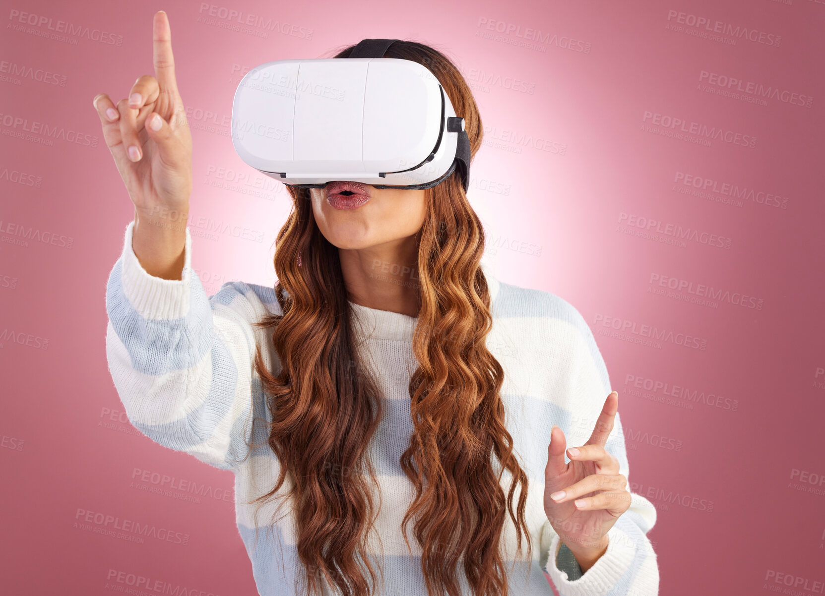 Buy stock photo Virtual reality, metaverse and AI with a woman a headset to access the online world of gaming. Innovation, 3D or VR and a female gamer in studio on a pink background with future technology