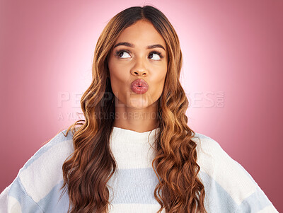 Buy stock photo Kiss mouth, face and studio with a woman with kissing, love and emoji expression feeling silly. Playful, fun and isolated pink background with copy space of a female model with a funny humor and joke