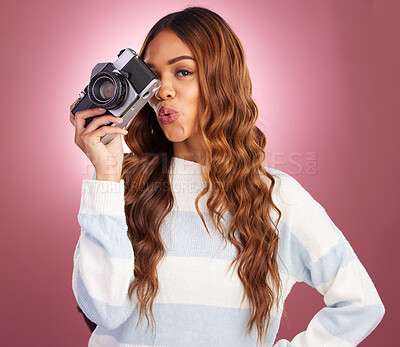 Buy stock photo Portrait, photography and happy woman in studio with camera, pose and gen z retro aesthetic on pink background. Face, photographer and girl posing for picture, photo or photograph on isolated mockup