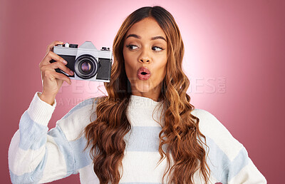 Buy stock photo Photography, excited woman with camera on studio background and creative travel or fashion shoot. Art, professional lifestyle and hispanic photographer with hobby or career in photos or pictures.