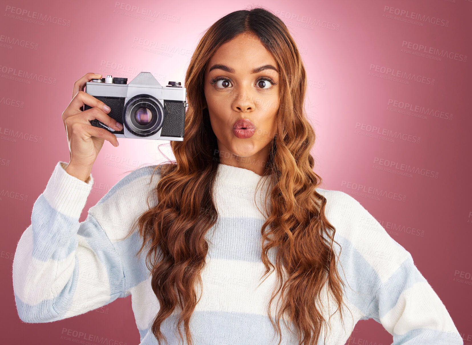 Buy stock photo Photography, woman with camera and comic face on studio background, creative travel or fashion shoot. Art, professional lifestyle and hispanic photographer with hobby or career in photos or pictures.