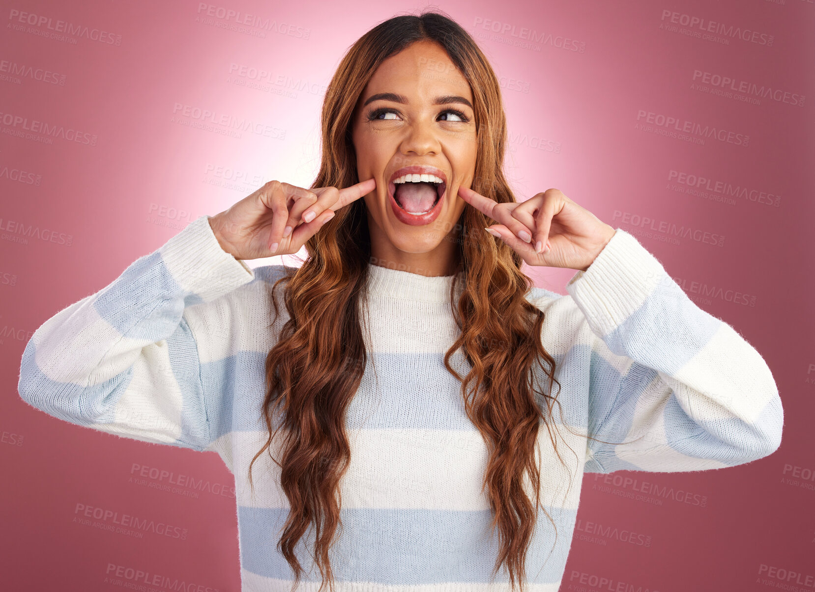 Buy stock photo Cute smile, happy woman and youth in a studio with a gen z female in isolated pink background. Happiness, fun and silly young person with casual fashion feeling crazy and playful from funny joke