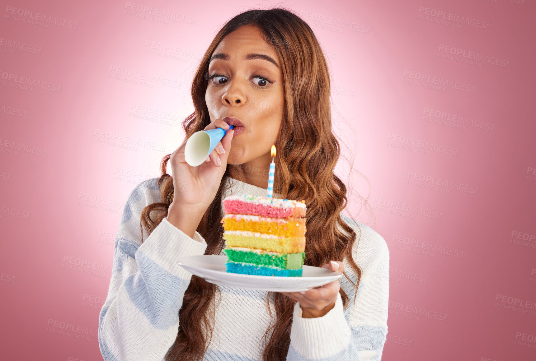 Buy stock photo Happy, cake and celebration with woman in studio for birthday, party and event. Rainbow, dessert and cheering with young female isolated on pink background for food, happiness and festive treat