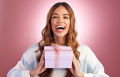 Buy stock photo Woman, gift and box in studio portrait with happiness, surprise and celebration by gradient background. Student girl, young and happy with present package, excited face and celebrate for birthday