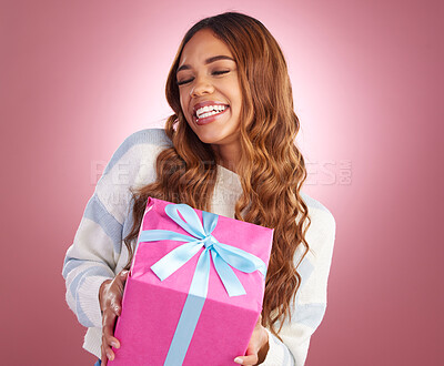 Buy stock photo Gift, happy and woman in studio with present for birthday, celebration or prize on pink background. Smile, box and gir winner excited with package, giveaway or party gesture while posing isolated