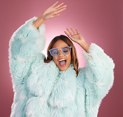 Buy stock photo Fashion and dance with woman in fur coat in studio for glamour, elegant and trendy style. Happy, natural and confidence with female dancing on pink background for classy, music and winter