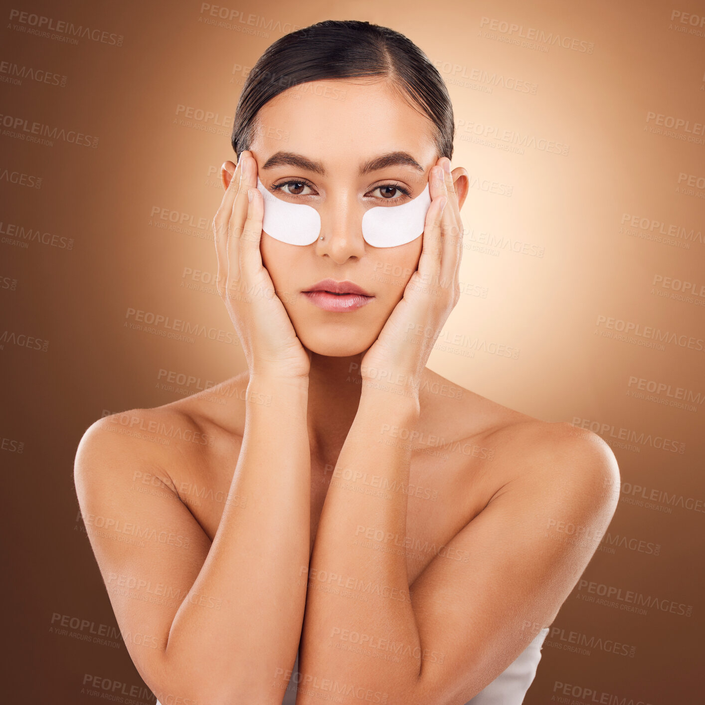 Buy stock photo Woman beauty, face portrait and eye patch for studio dermatology, spa healthcare or cosmetics routine. Skincare, facial collagen product or female model with hyaluronic acid mask on brown background