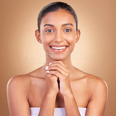 Buy stock photo Beauty, skincare and portrait with indian woman in studio for happy, spa detox and facial. Cosmetics, self care and glow with model on brown background for satisfaction, natural makeup or confidence