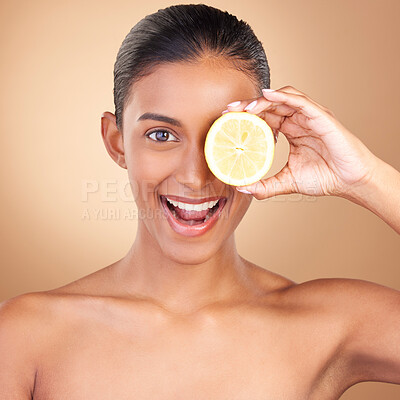 Buy stock photo Skincare, happy woman portrait and lemon for health, wellness and beauty of a young model. Studio, smile and healthy fruit with vitamin c benefits and fruits nutrition for facial and dermatology