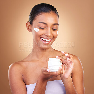 Buy stock photo Skincare, beauty product lotion and glow of a happy woman with cosmetic and cream. Isolated, studio background and model with a smile from face cleaning, cosmetics and dermatology facial sunscreen