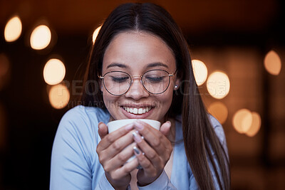 Buy stock photo Smile, cup and a woman drinking coffee at night while working late in a dark office on a deadline. Happy, mug and an attractive young female smelling the aroma or scent from a fresh mug of caffeine