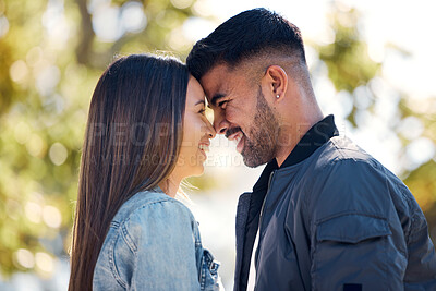 Buy stock photo Couple, outdoor and smile on face for love, care and happiness together in summer. Head of young man and woman at nature park for affection or hug on a happy and romantic date or vacation to relax