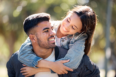 Buy stock photo Couple, outdoor and piggy back with a smile for love, care and happiness together in summer. Young man and woman at nature park for affection or hug on a happy and romantic date or vacation to relax