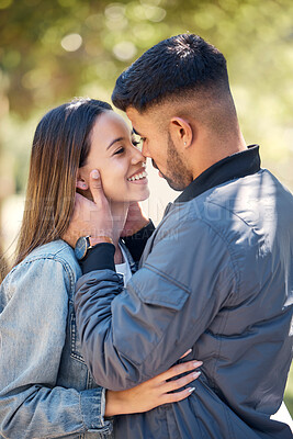 Buy stock photo Smile, outdoor and couple with love, care and happiness together in summer. Young man and woman happy face at nature park for affection or kiss on a romantic date, holiday or vacation to relax