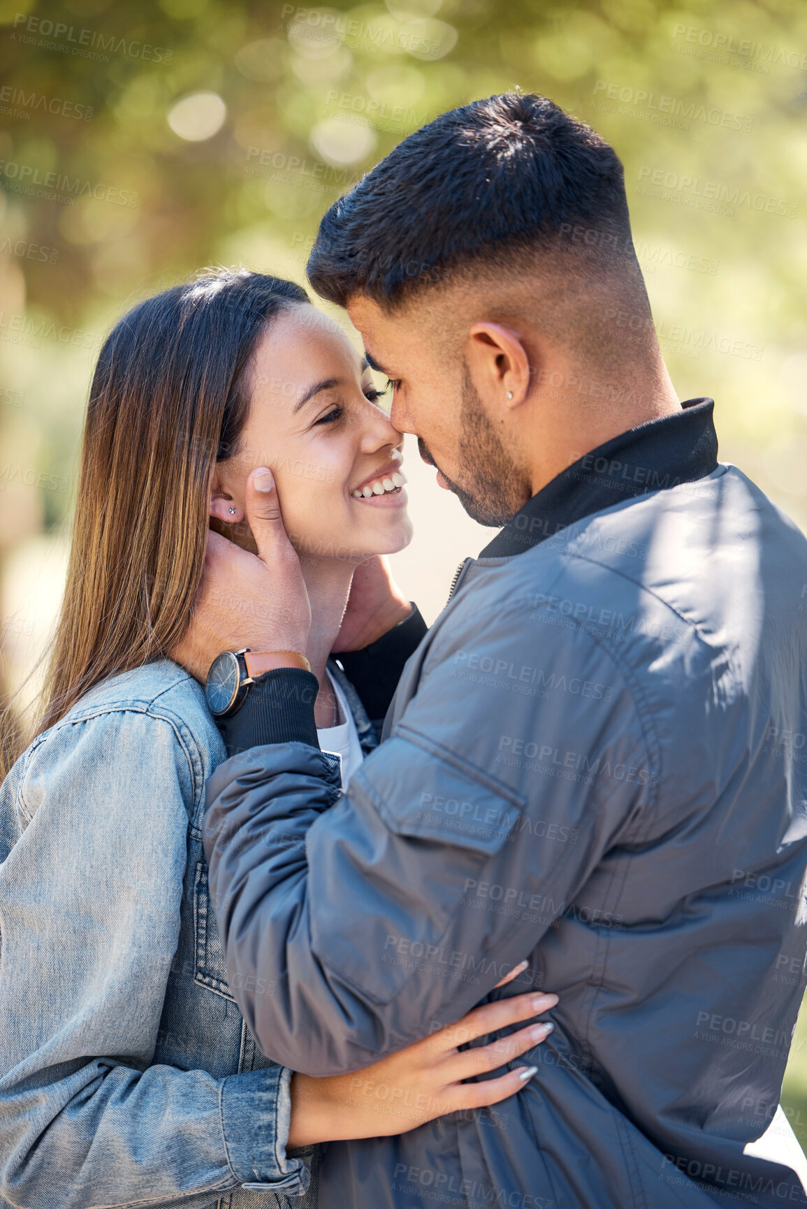 Buy stock photo Smile, outdoor and couple with love, care and happiness together in summer. Young man and woman happy face at nature park for affection or kiss on a romantic date, holiday or vacation to relax