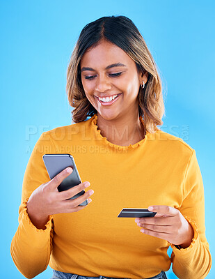 Buy stock photo Happy woman, credit card and phone in studio for online shopping, digital fintech payment and customer money. Female model, ecommerce and mobile banking for finance, cash economy and sales promotion