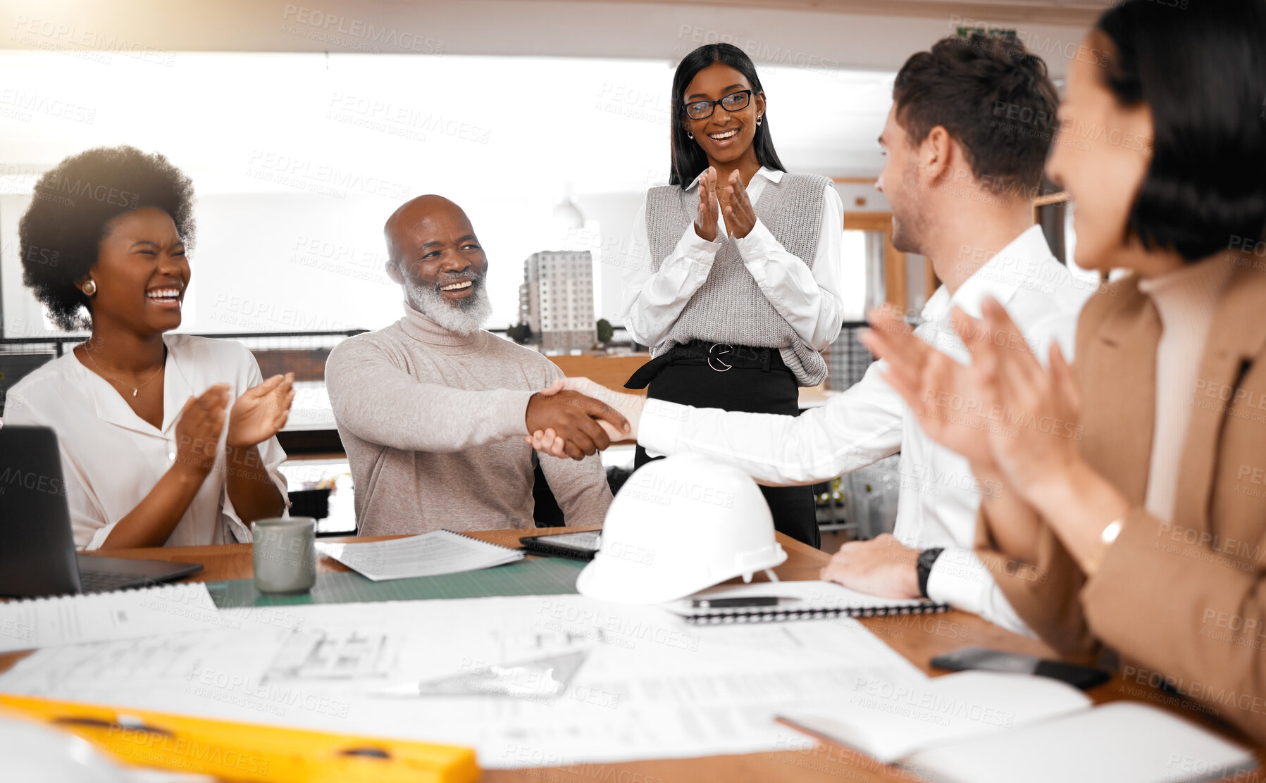 Buy stock photo Handshake, meeting and team of architecture people clapping, celebration and partnership success, goals or onboarding. Engineering employees shake hands for design project, contract or job thank you