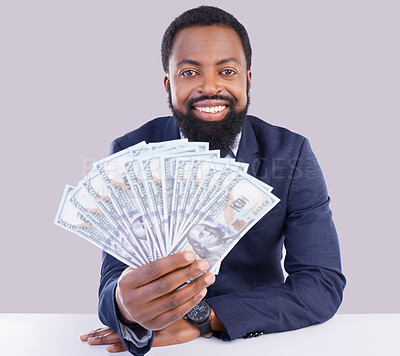 Portrait, cash and economy with a business black man in studio on a gray background as a lottery winner. Money, accounting and finance with a male employee holding dollar bills for investment