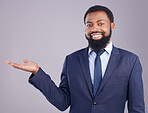 Portrait, black man and product placement for business in studio isolated on a gray background. Marketing, mockup and smile of happy African professional with branding, advertising or mock up space.