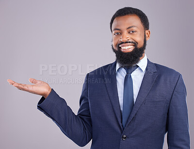 Buy stock photo Portrait, black man and product placement for business in studio isolated on a gray background. Marketing, mockup and smile of happy African professional with branding, advertising or mock up space.