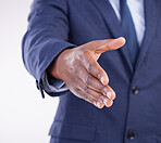 Open hand shake, studio closeup and man with welcome, hiring opportunity and partnership by white background. Recruitment expert, businessman or hr manager with shaking hands in agreement by backdrop