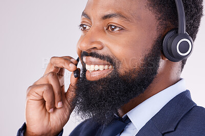 Buy stock photo Call center, smile and face of black man with microphone for crm questions, sales consulting and help. Happy male telemarketing consultant in studio for contact, telecom and friendly customer support