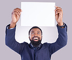 Business, excited man and poster in white background, studio or mockup space. Happy corporate, black male and holding board, marketing wow news and advertising banner for blank mock up, paper or sign