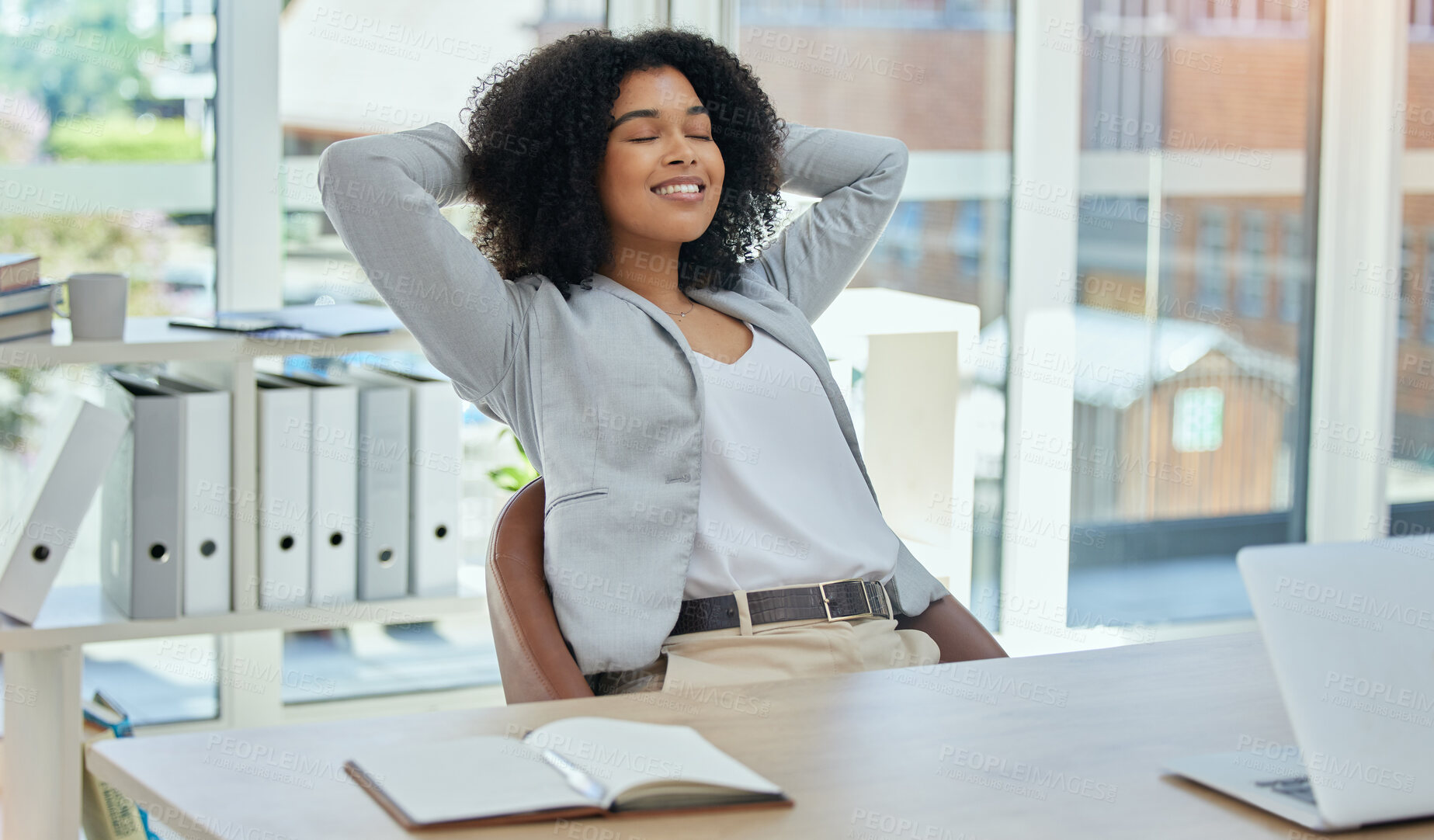 Buy stock photo Happy business woman stretching at desk for relax, career success and work life balance in her office. Professional worker or biracial person calm, confident and peace for project time management