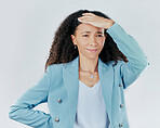 Confused, headache and a woman looking tired isolated on a white background in a studio. Anxiety, frustrated and a young woman with a painful migraine, stressed and anxious about work on a backdrop