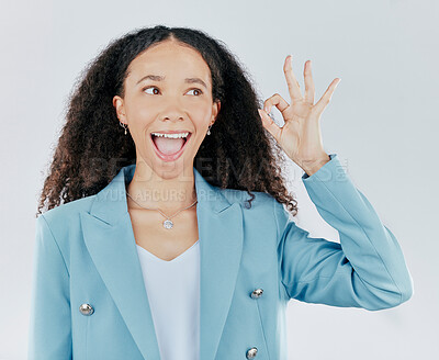 Buy stock photo Woman, okay sign and wow face in studio for agreement, support and success. Excited female person thinking and hand gesture emoji for thank you, sale or agreement isolated on a white background
