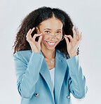 Smart, happy and portrait of a woman with glasses isolated on a white background in a studio. Smile, intelligent and the face of a girl with eyewear, showing eyeglasses and accessory for vision